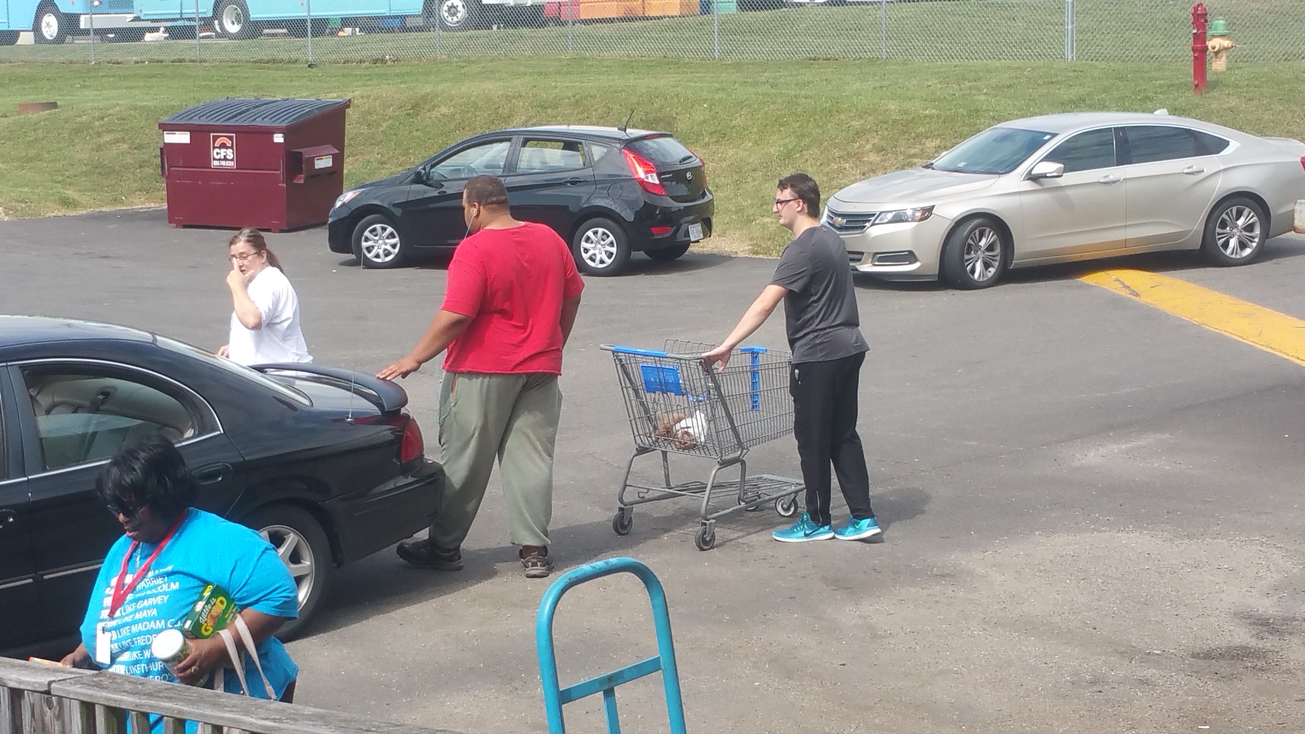 people in the parking lot
