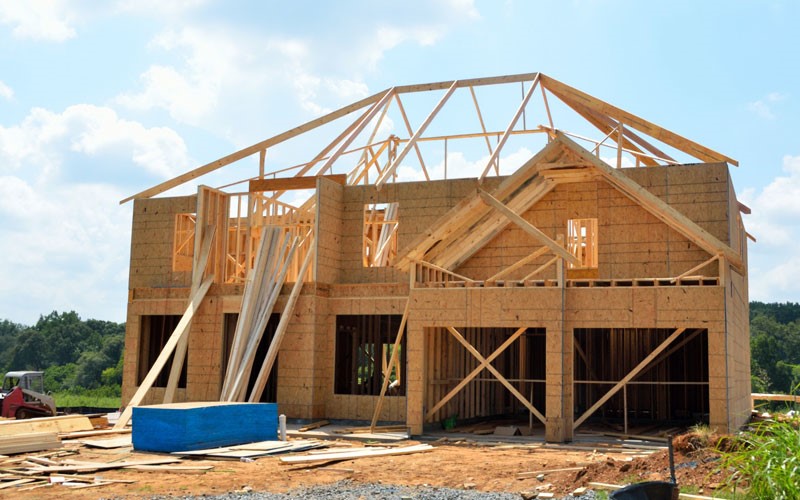 people working on a house