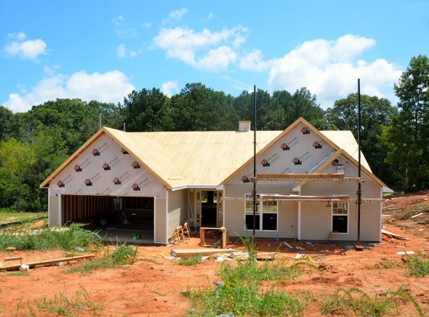 people working on a house