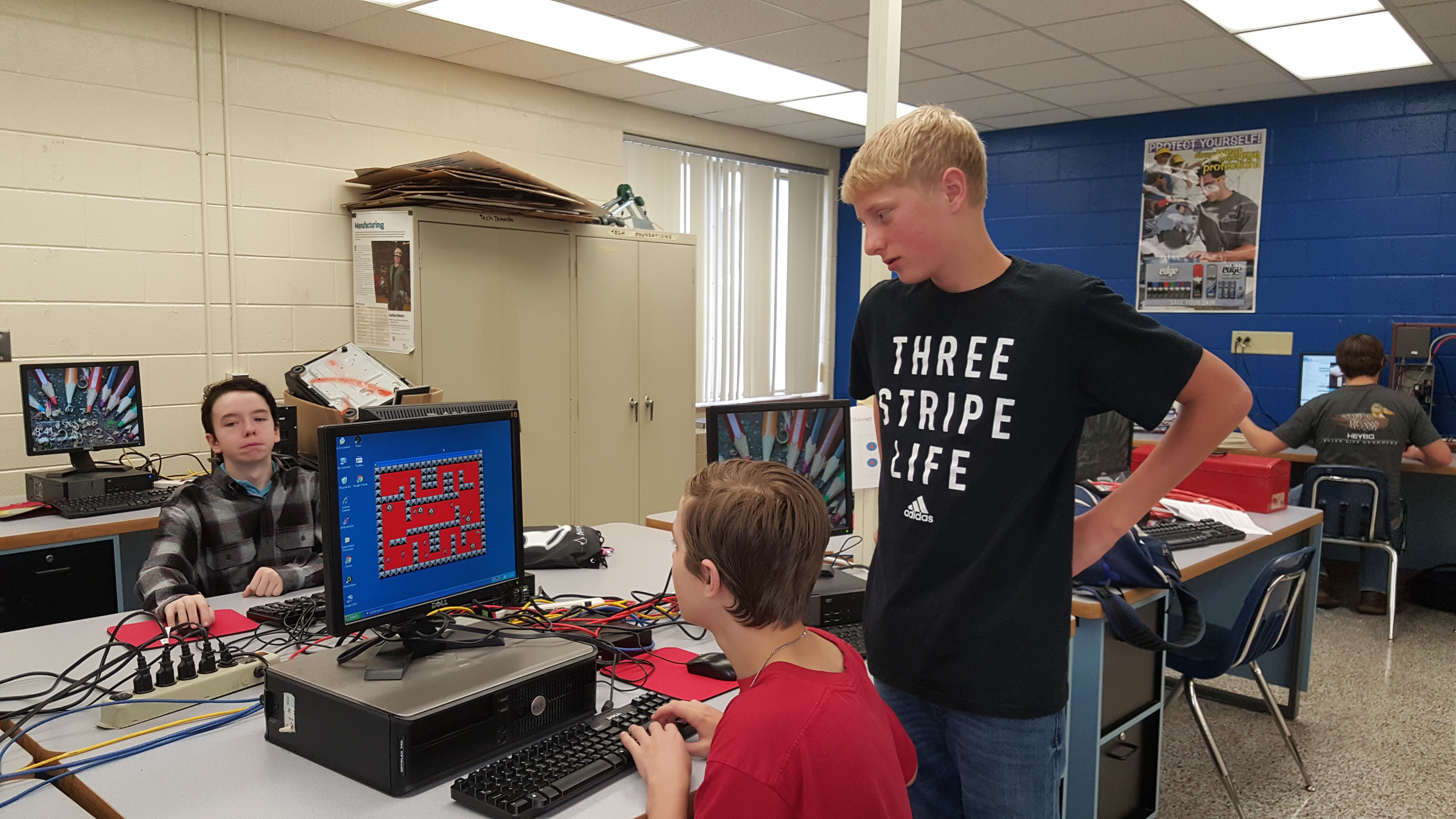 teacher helping student