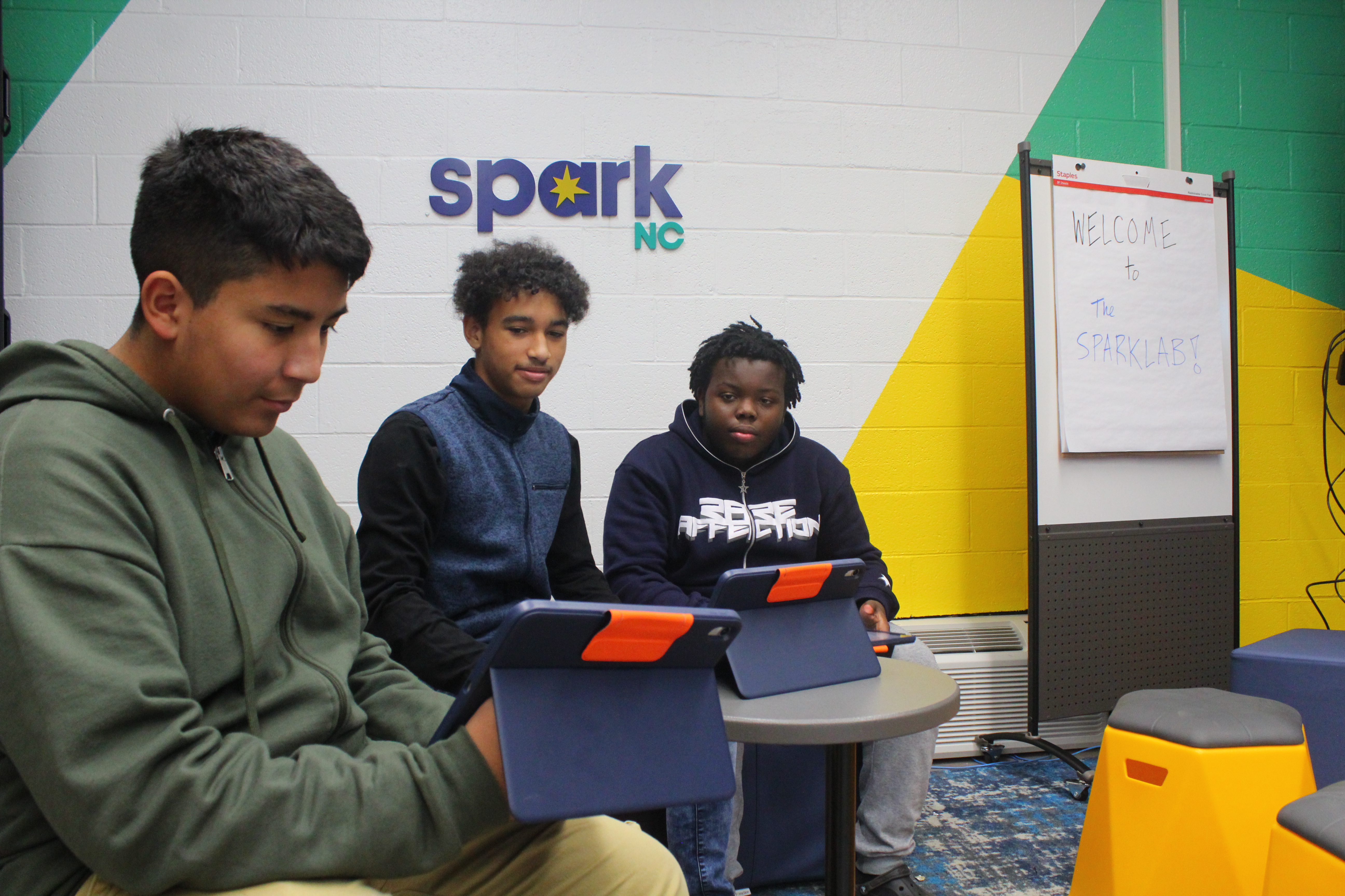 Students collaborating in the Sparklab