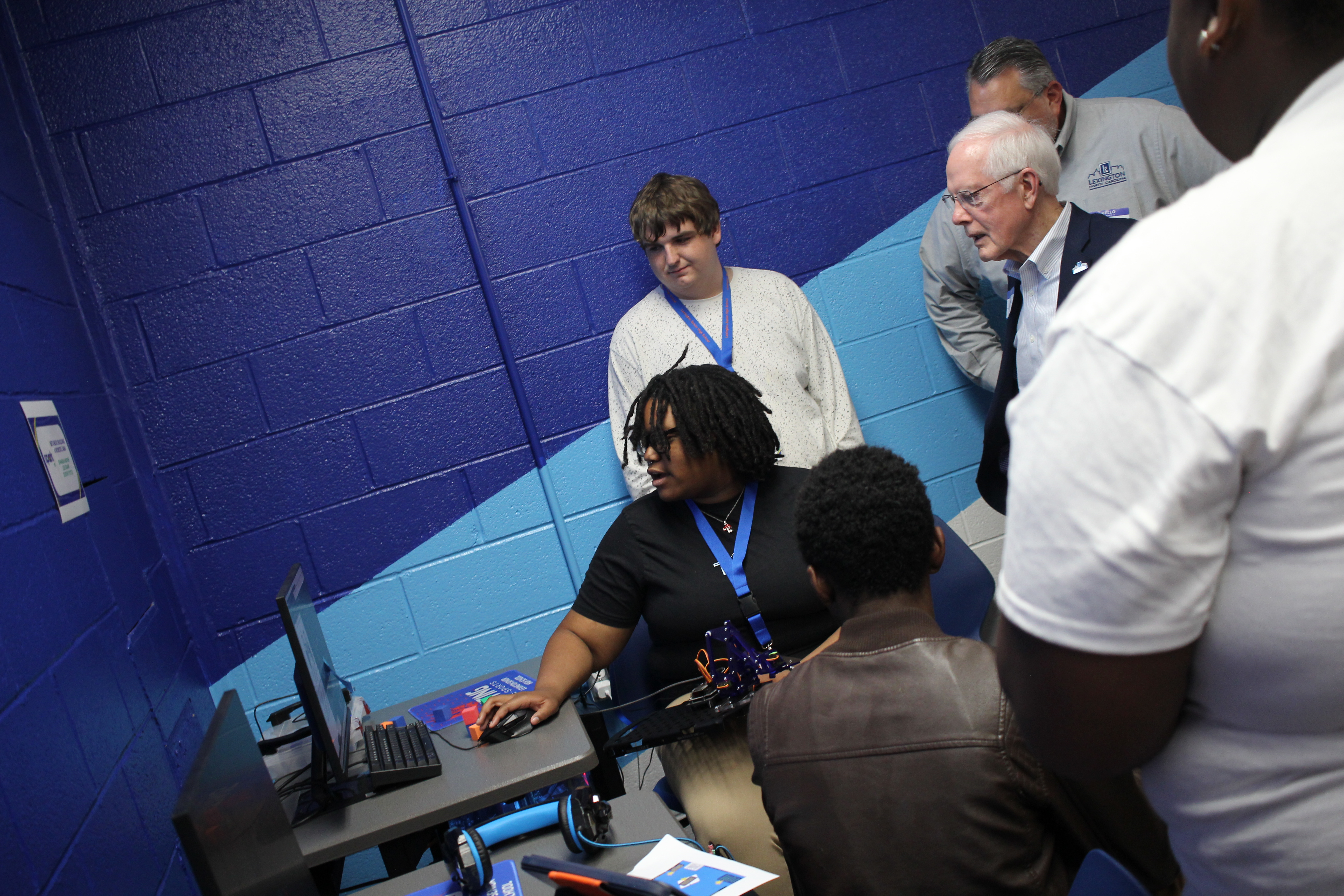 Students show off the robotic arm they built to local officials from the Lexington City Council, and Chamber of Commerce!