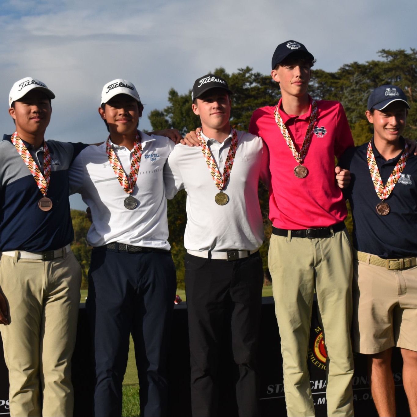 students wearing a medal 