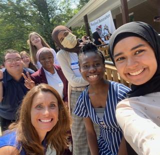 people smiling taking a selfie