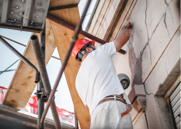 Man putting up stucco