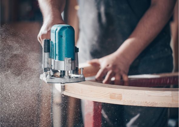 Man cutting up wood