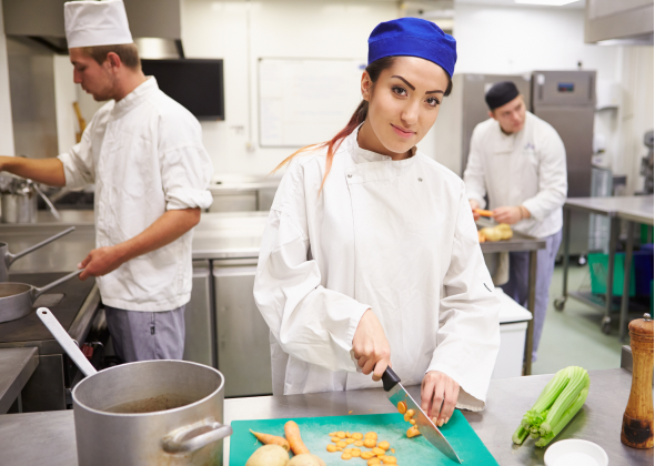 Chefs working in kitchen