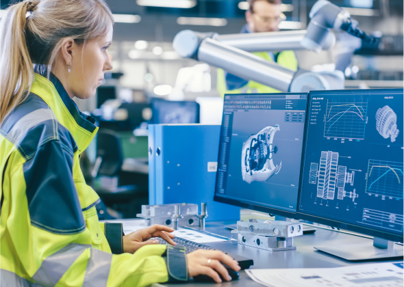 Woman working with double monitors