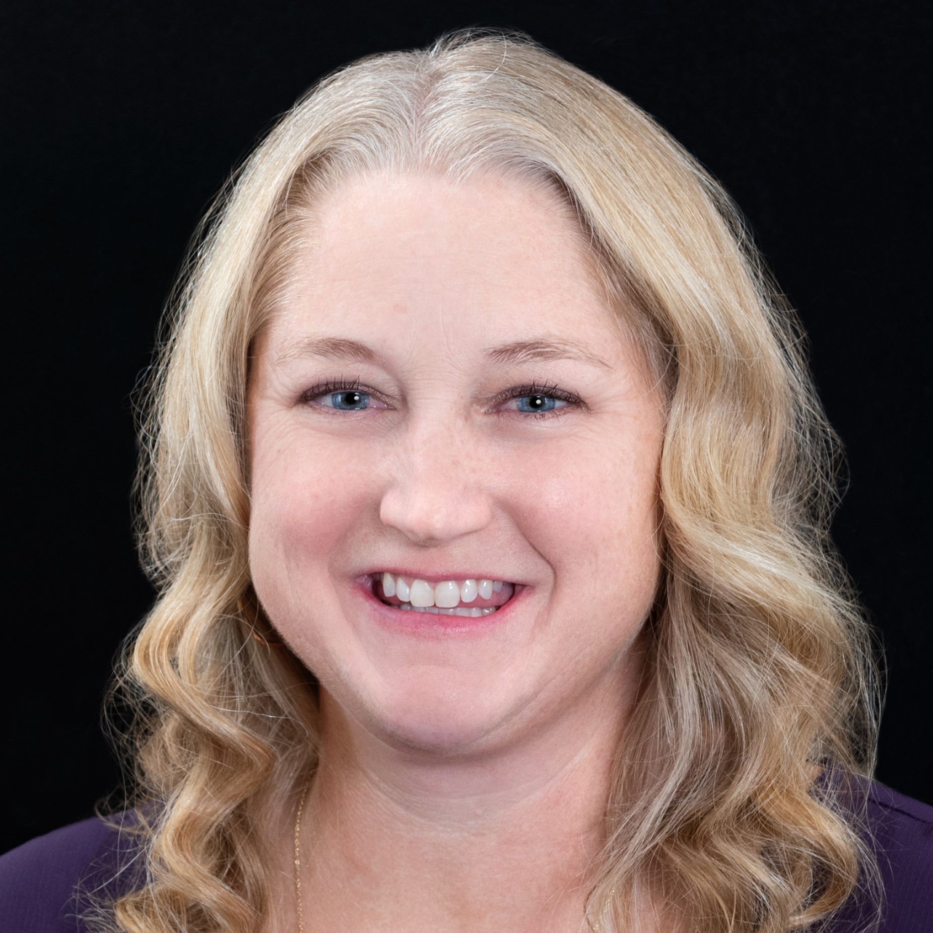 Headshot of Corinne Shuck Seidel