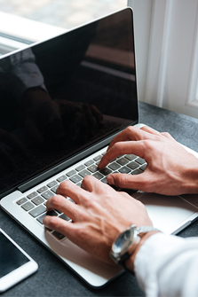 Person Typing on computer