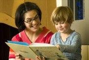 Teacher and student reading
