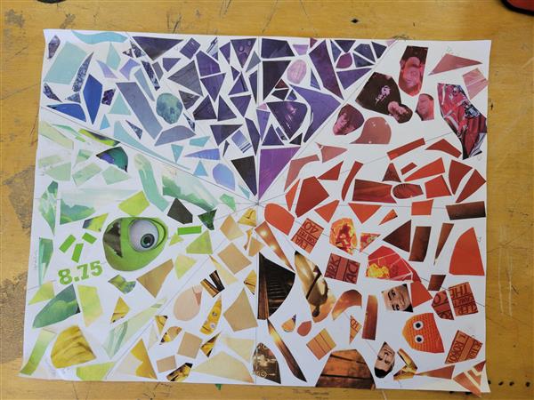 A colorful and vibrant mosaic art piece on a table.
