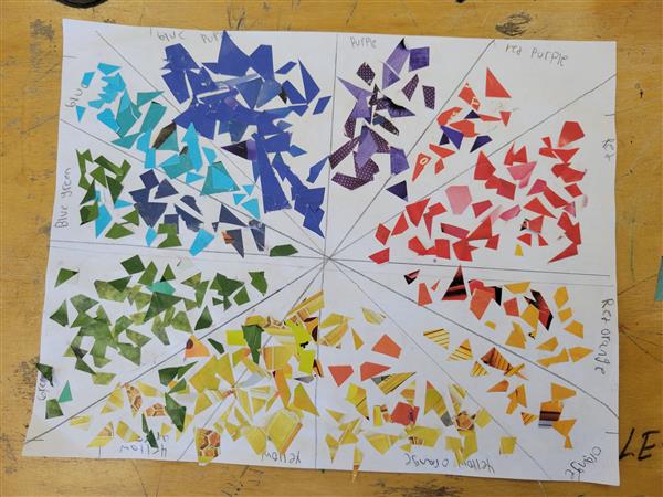 A colorful and vibrant mosaic art piece on a table.