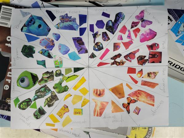 A colorful and vibrant mosaic art piece on a table.