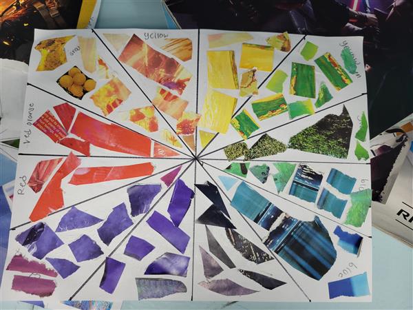 A colorful and vibrant mosaic art piece on a table.