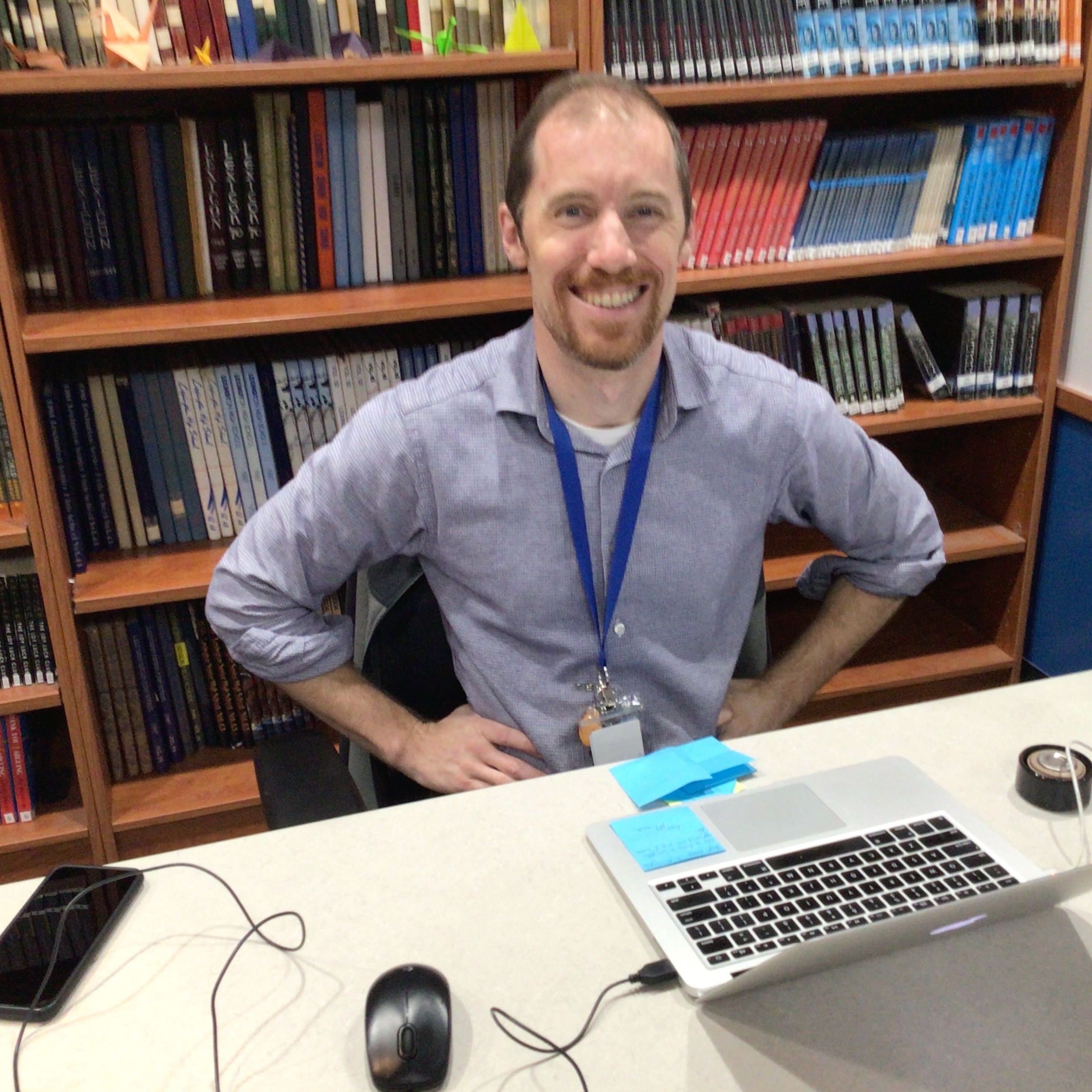 Mr. Hudson at the desk
