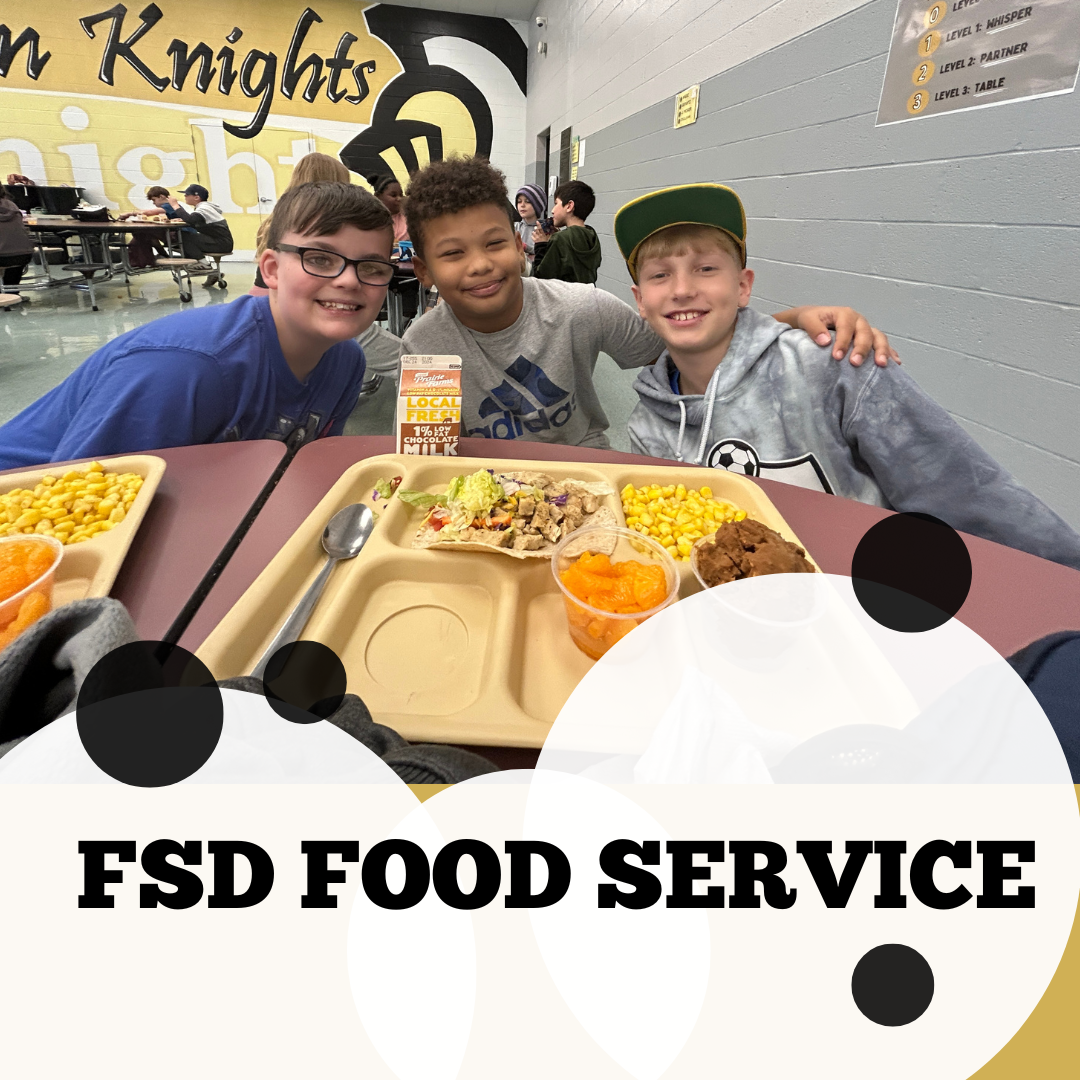 students in cafe with lunch tray