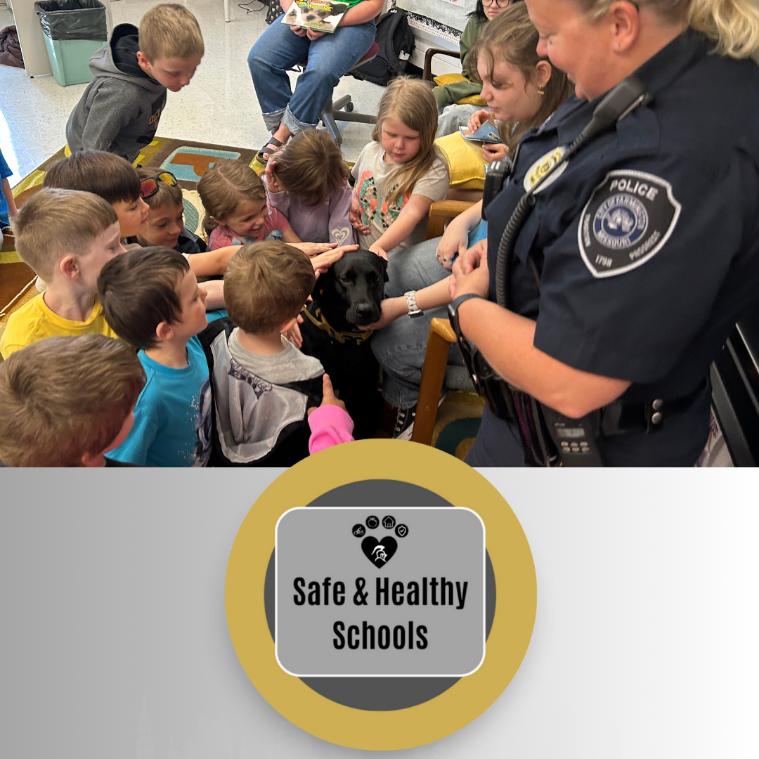 Safe and Healthy schools school resource officer and Frida with a class of students