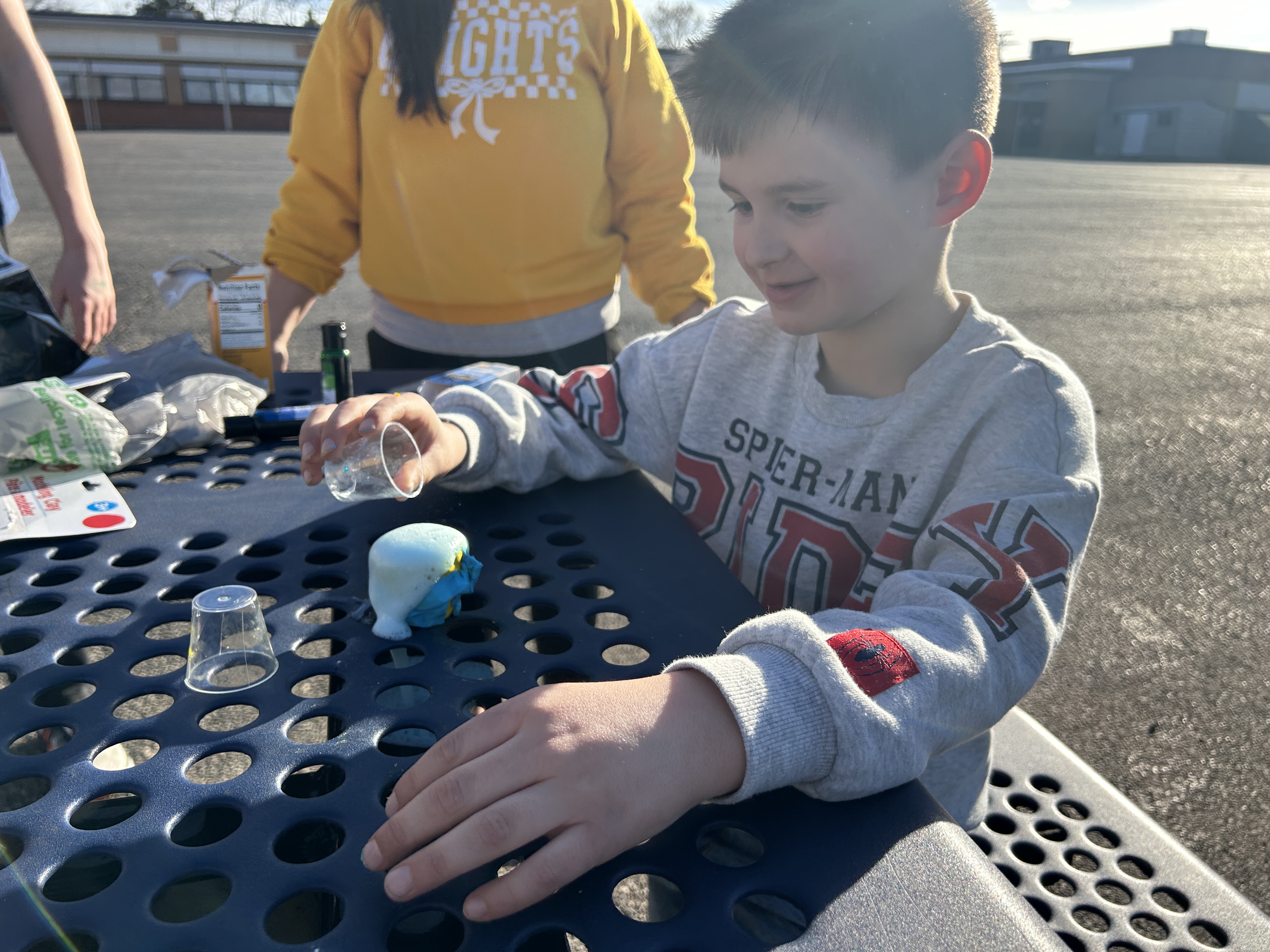 student watching a science experiment