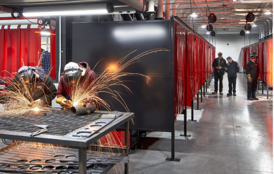 photo of students welding