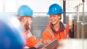 student and teacher in hard hats