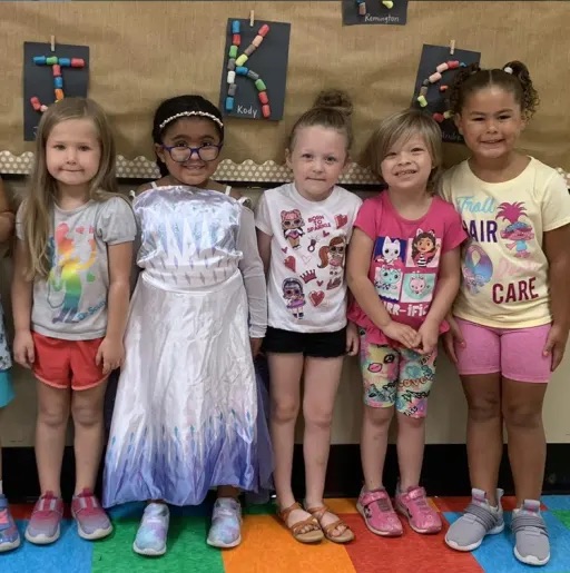 kids standing in classroom