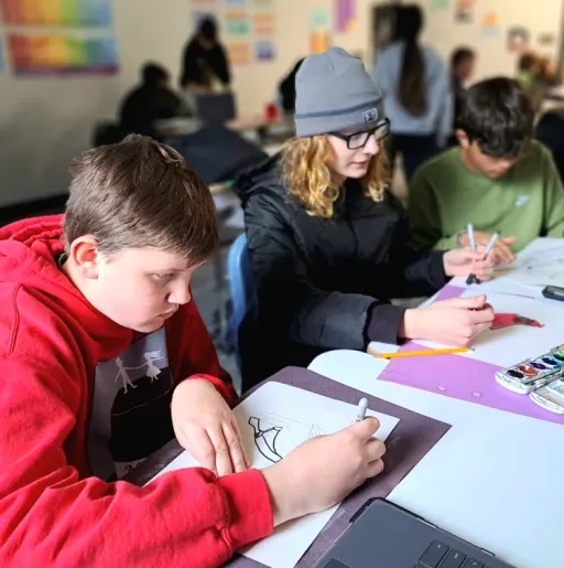 kids working in the class table