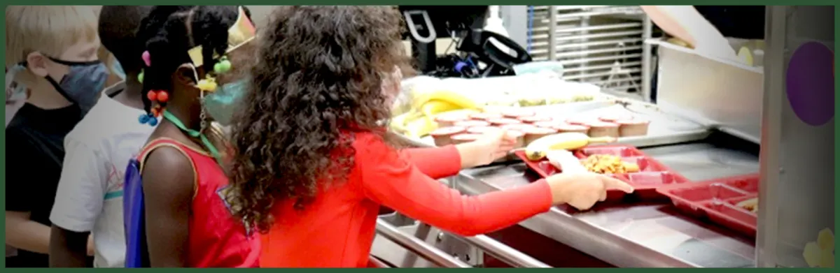 kids getting their meals at the cafeteria 