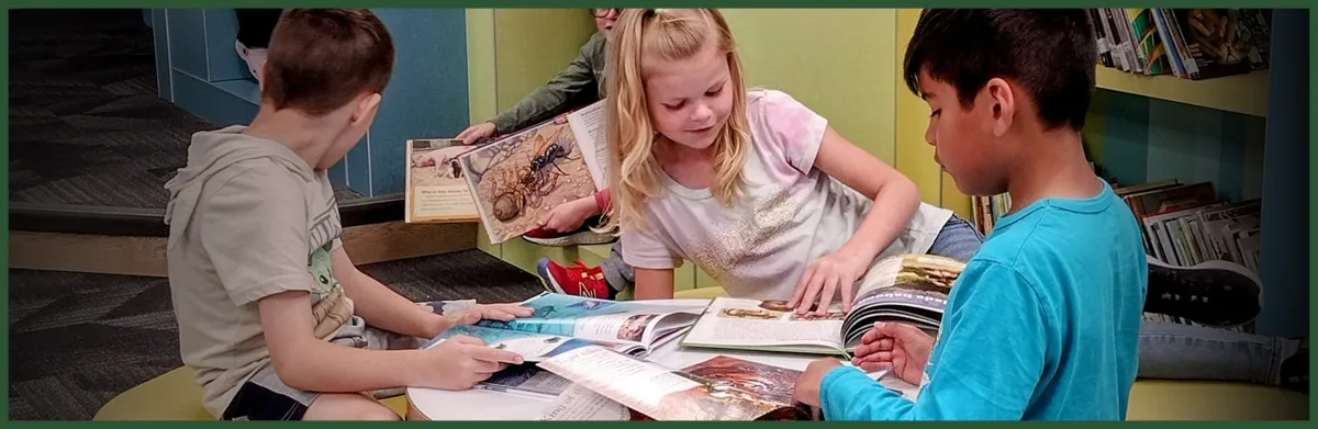 three students in the classroom
