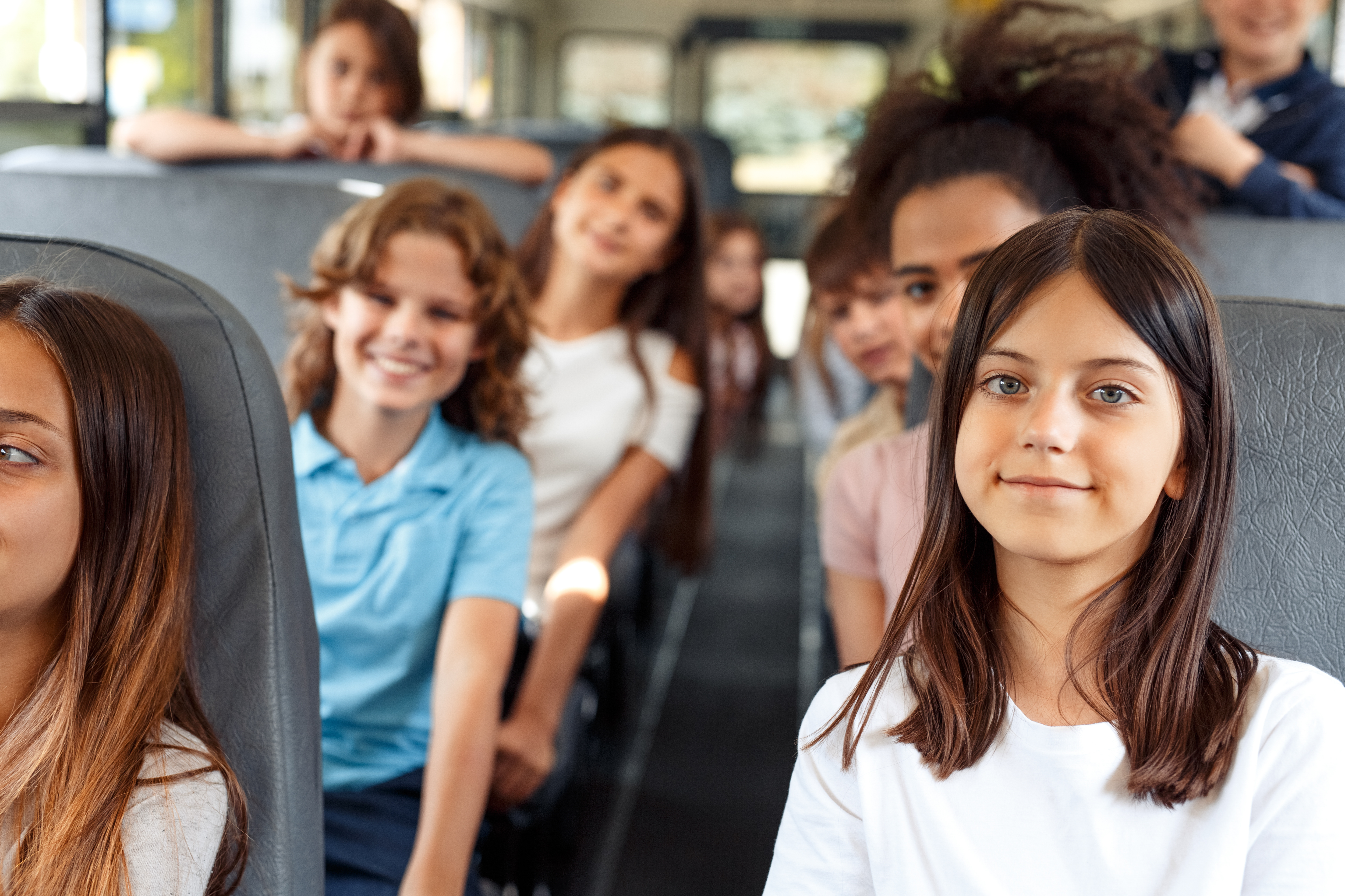 Students sitting on bus