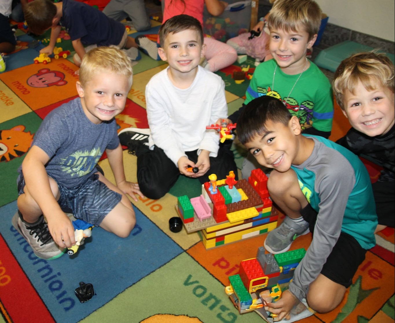 Kids building with legos