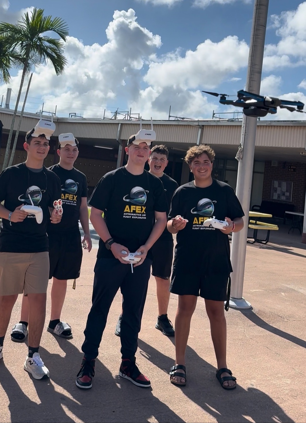 Student flying drone in AFEX program