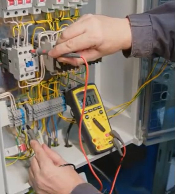 Student checking current in new electrical program at Heritage High