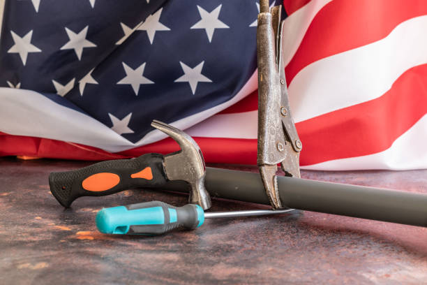 Hand held tools in front of American Flag