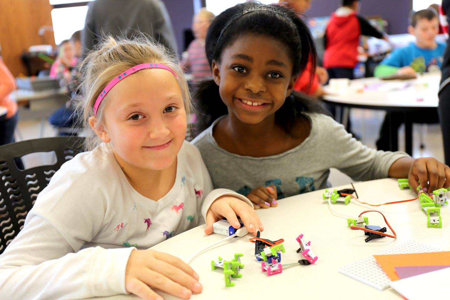 Girls working electronics