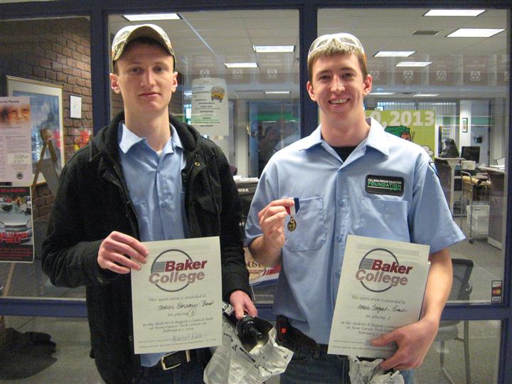 two happy men with a certificate