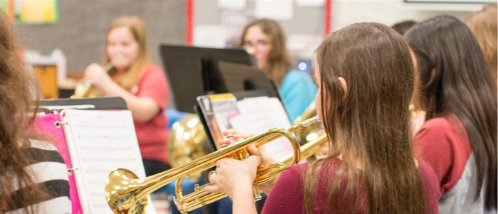 Students playing trumpet