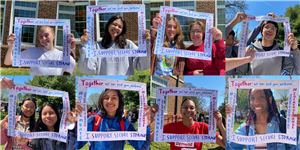 students in campus smiling