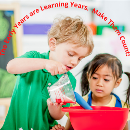 2 kids pouring liquid into a bucket 