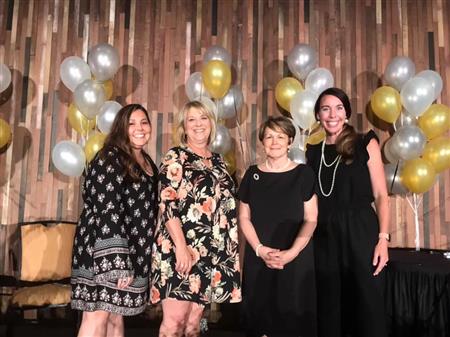 core awards winners at the event, smiling at the camera