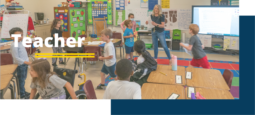 students and teacher her in classroom in activity