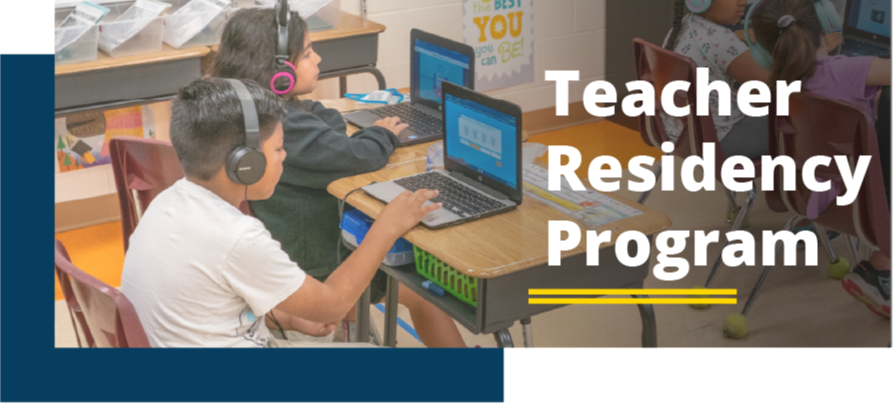 students working on a laptop at classroom