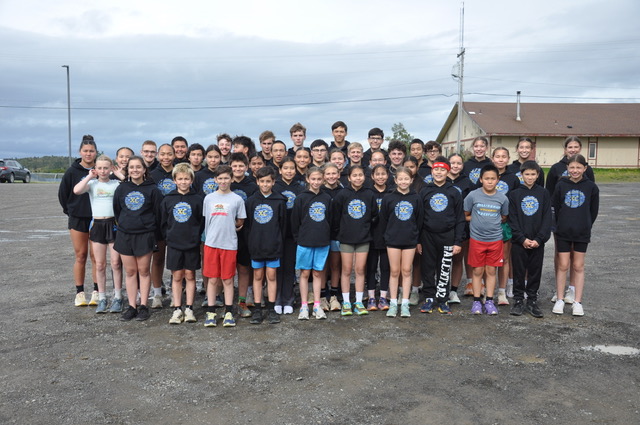 cross country teamplayers and their coaches