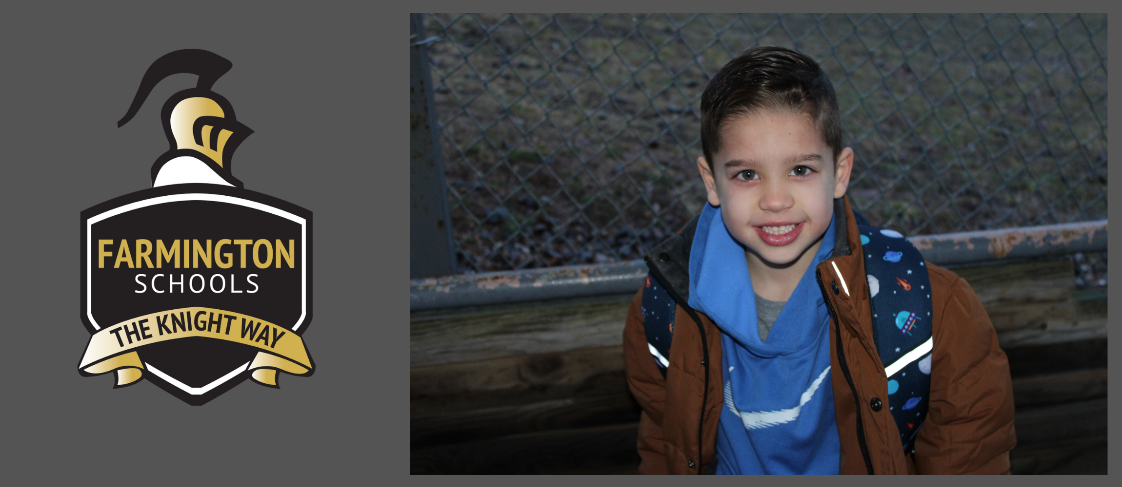 young boy walking into school