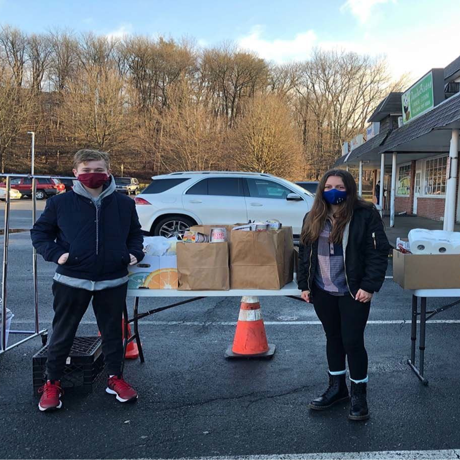 9th grade students at the grade Food Drive