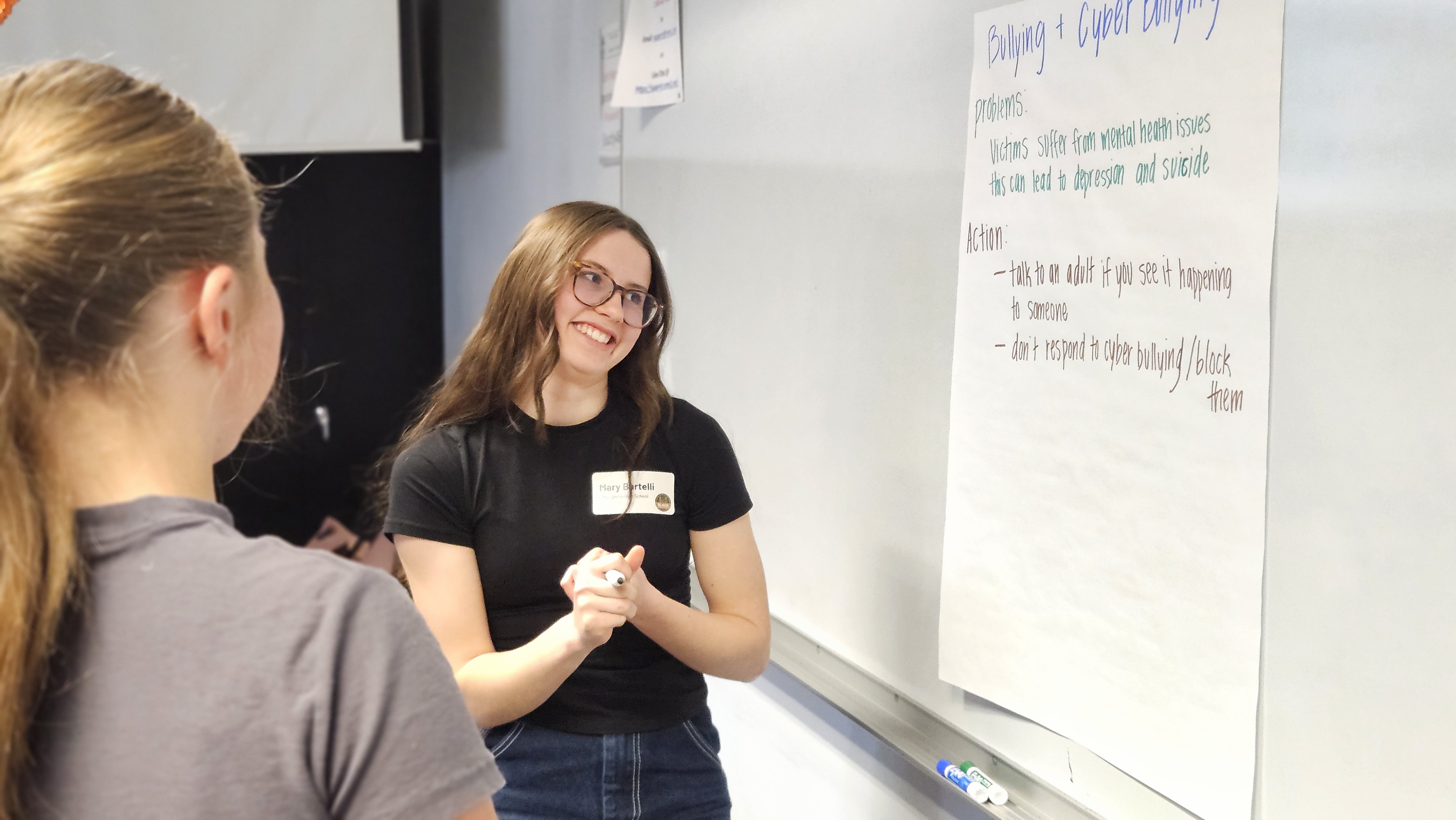 Header image of girl looking at chalkboard