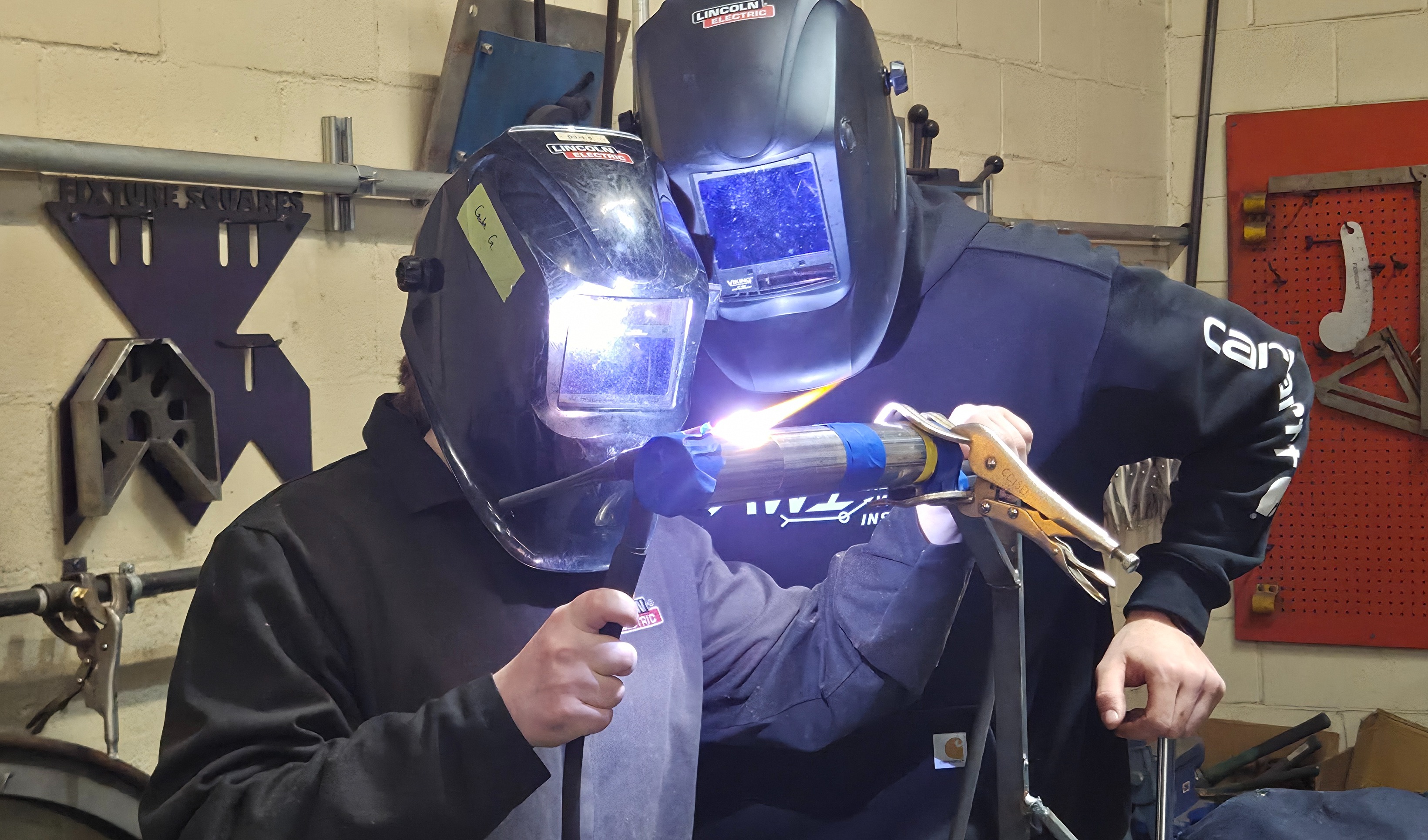 CTE Header with Welding Student