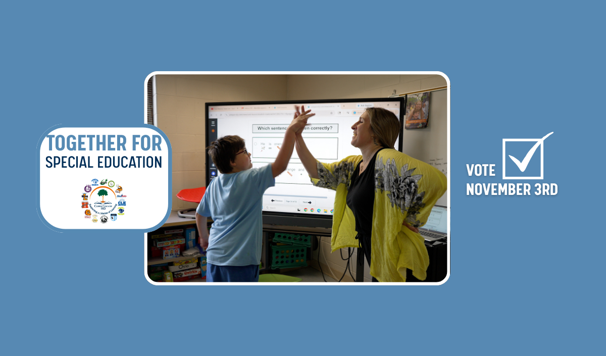 Student giving a high five to a teacher.