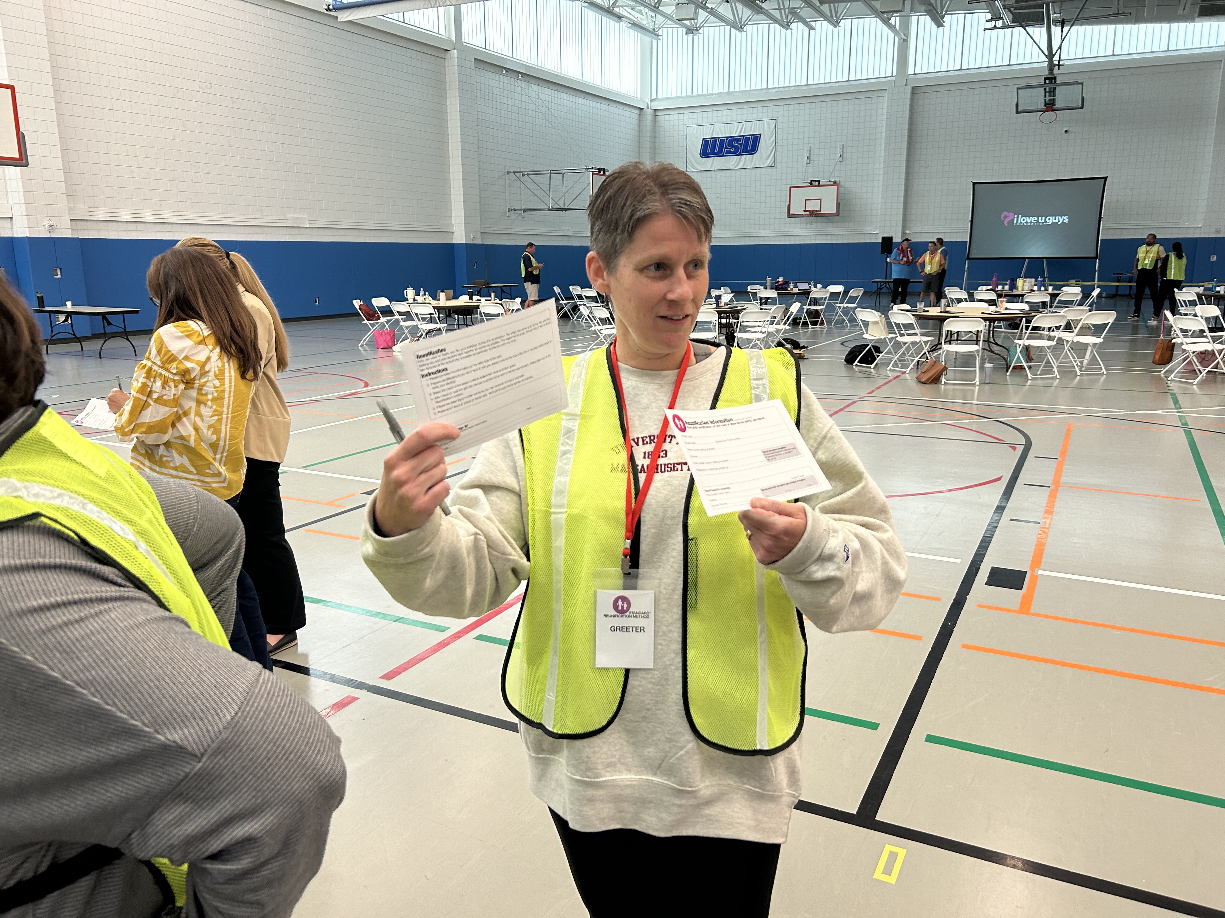 A woman wearing a safety vest