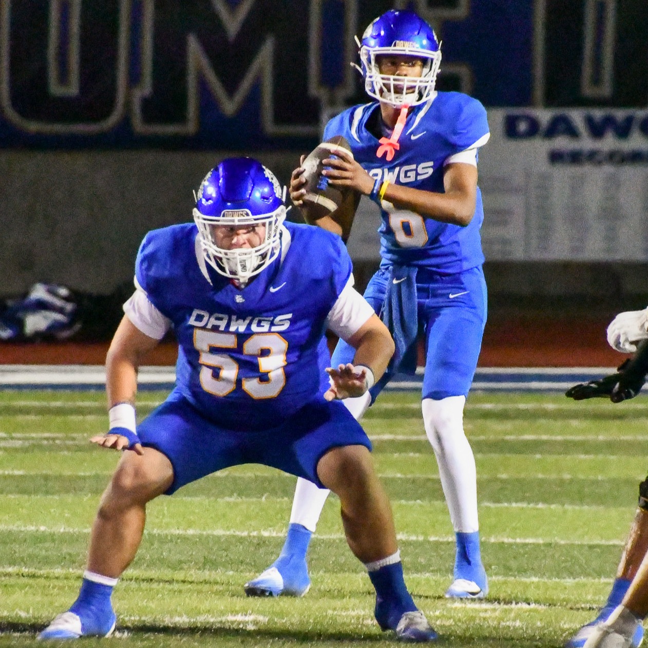 Football player looking to throw a pass